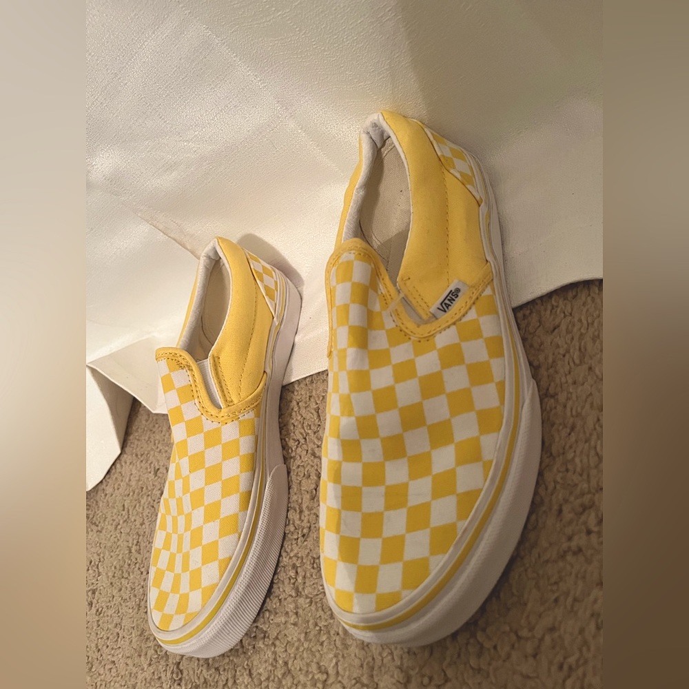 Yellow slip on checkered vans